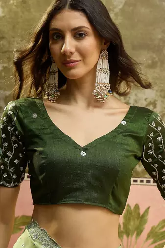 Green georgette embroidered saree with unstitched blouse piece