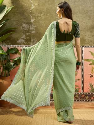 Green georgette embroidered saree with unstitched blouse piece 4