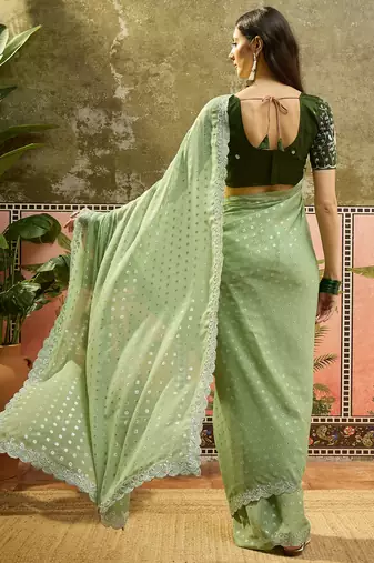 Green georgette embroidered saree with unstitched blouse piece