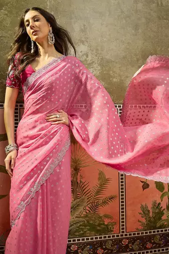Pink georgette embroidered saree with unstitched blouse piece
