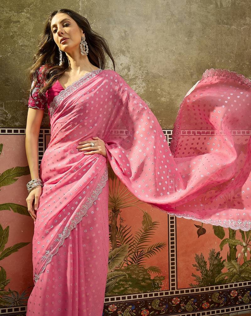 Pink georgette embroidered saree with unstitched blouse piece