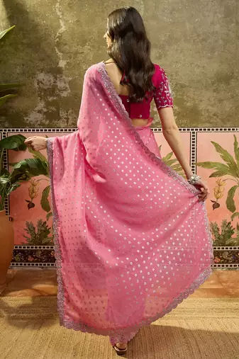 Pink georgette embroidered saree with unstitched blouse piece