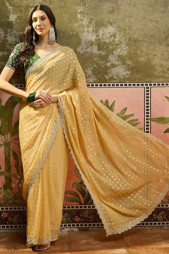 Yellow georgette embroidered saree with unstitched blouse piece