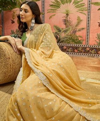 Yellow georgette embroidered saree with unstitched blouse piece 2