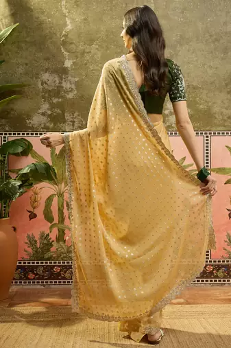 Yellow georgette embroidered saree with unstitched blouse piece