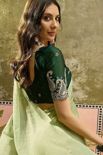 Green chiffon embroidered saree with unstitched blouse piece