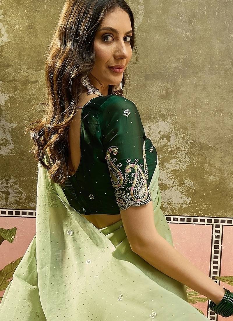 Green chiffon embroidered saree with unstitched blouse piece