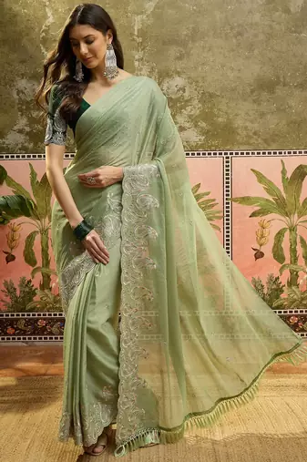 Green chiffon embroidered saree with unstitched blouse piece