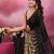 Black and gold sequins embroidered georgette party wear saree with blouse piece