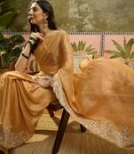 Mustard chiffon embroidered saree with unstitched blouse piece