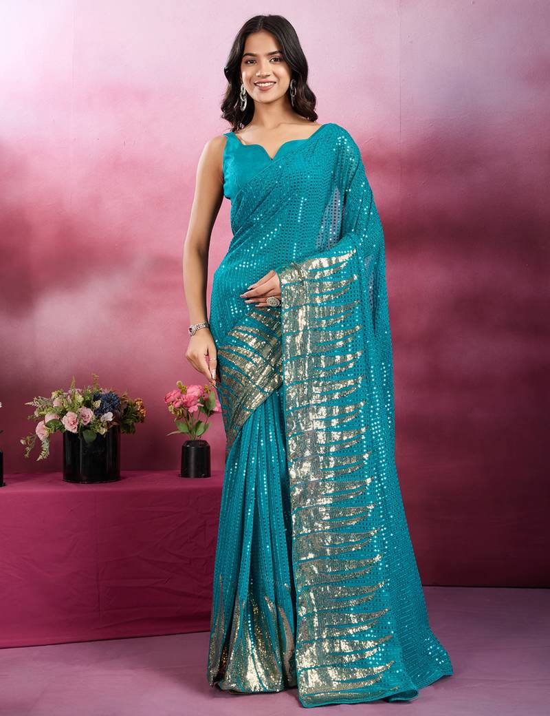 Rama and gold sequins embroidered georgette party wear saree with blouse piece