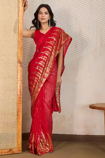 Red and gold sequins embroidered georgette party wear saree with blouse piece