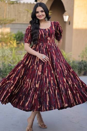 Women maroon & gold printed long dress with flared design