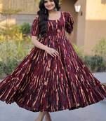 Women maroon & gold printed long dress with flared design
