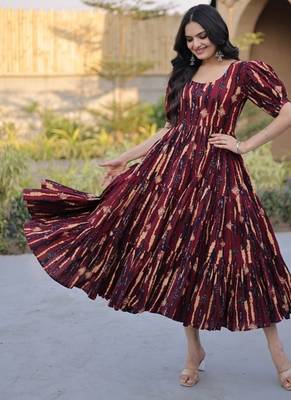 Women maroon & gold printed long dress with flared design 2