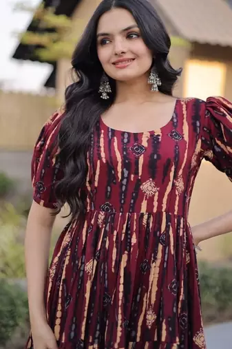 Women maroon & gold printed long dress with flared design