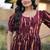 Women maroon & gold printed long dress with flared design