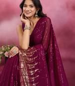 Wine and gold sequins embroidered georgette party wear saree with blouse piece