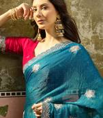 Teal silk blend chiffon embellished saree with unstitched blouse piece