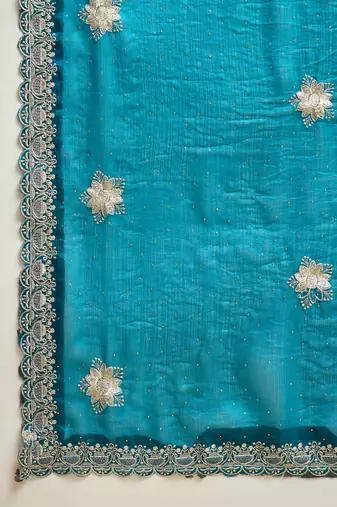 Teal silk blend chiffon embellished saree with unstitched blouse piece