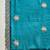Teal silk chiffon embellished saree with unstitched blouse piece