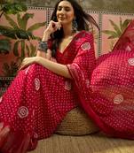 Rani georgette bandhni saree with unstitched blouse piece