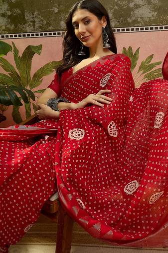 Red georgette bandhni saree with unstitched blouse piece