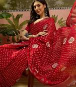 Red georgette bandhni saree with unstitched blouse piece