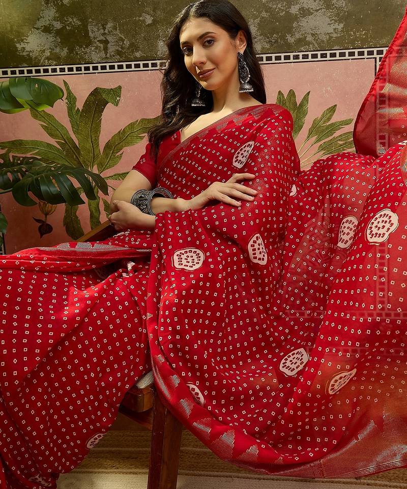 Red georgette bandhni saree with unstitched blouse piece