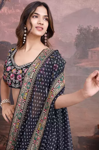 Black bandhani printed georgette saree with multi-color embroidered border and blouse piece