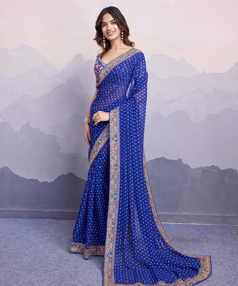 Blue bandhani printed georgette saree with multi-color embroidered border and blouse piece