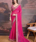 Pink bandhani printed georgette saree with multi-color embroidered border and blouse piece