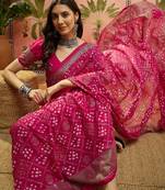 Rani georgette bandhni saree with unstitched blouse piece