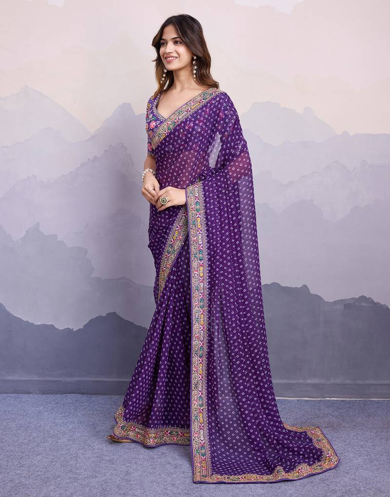 Purple bandhani printed georgette saree with multi-color embroidered border and blouse piece