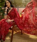 Red georgette bandhni saree with unstitched blouse piece