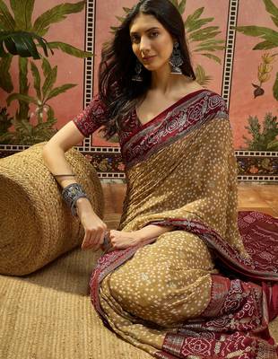 Beige georgette bandhni saree with unstitched blouse piece 1
