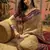 Beige georgette bandhni saree with unstitched blouse piece