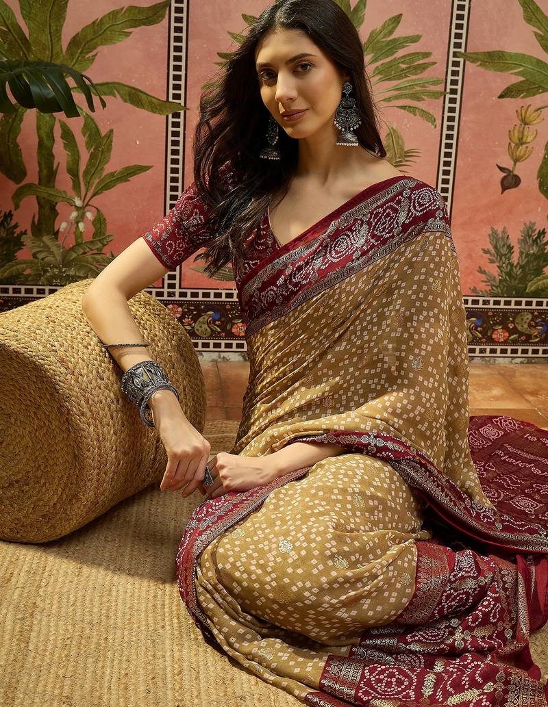 Beige georgette bandhni saree with unstitched blouse piece