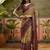 Beige georgette bandhni saree with unstitched blouse piece