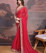Red bandhani printed georgette saree with multi-color embroidered border and blouse piece