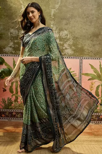 Green georgette bandhni saree with unstitched blouse piece