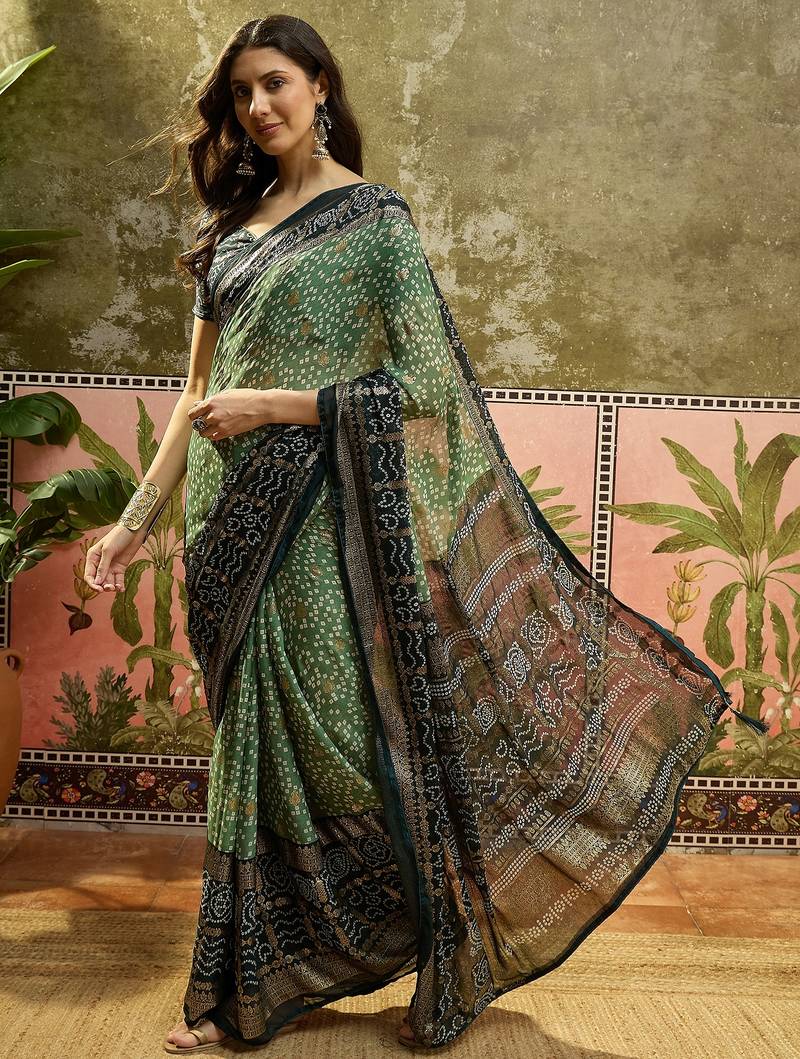 Green georgette bandhni saree with unstitched blouse piece