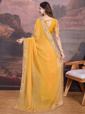 Yellow bandhani printed georgette saree with multi-color embroidered border and blouse piece 3