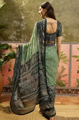 Green georgette bandhni saree with unstitched blouse piece