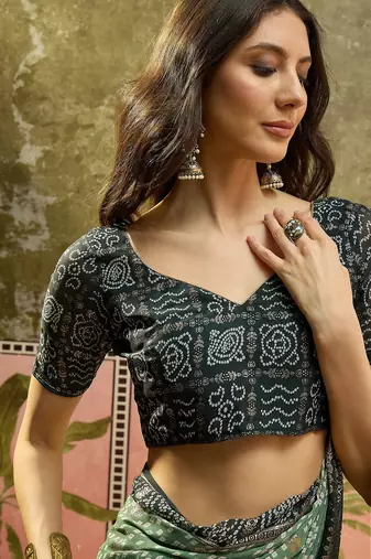 Green georgette bandhni saree with unstitched blouse piece