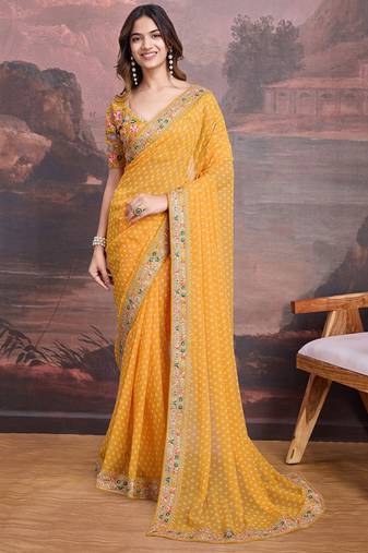 Yellow bandhani printed georgette saree with multi-color embroidered border and blouse piece