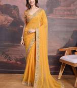 Yellow bandhani printed georgette saree with multi-color embroidered border and blouse piece