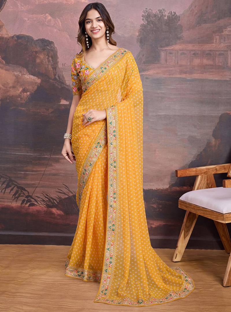 Yellow bandhani printed georgette saree with multi-color embroidered border and blouse piece