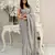 Grey all-over sequins striped georgette party wear saree with blouse piece