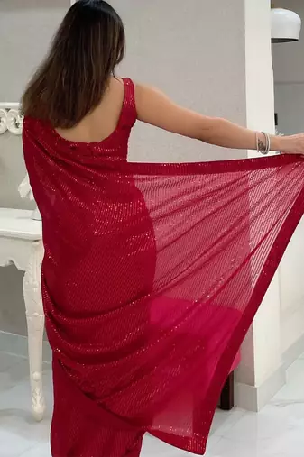 Maroon all-over sequins striped georgette party wear saree with blouse piece